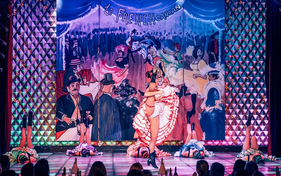 La Nouvelle Eve performers in pink stage costumes