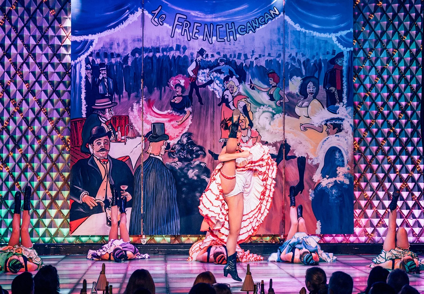 La Nouvelle Eve performers in pink stage costumes
