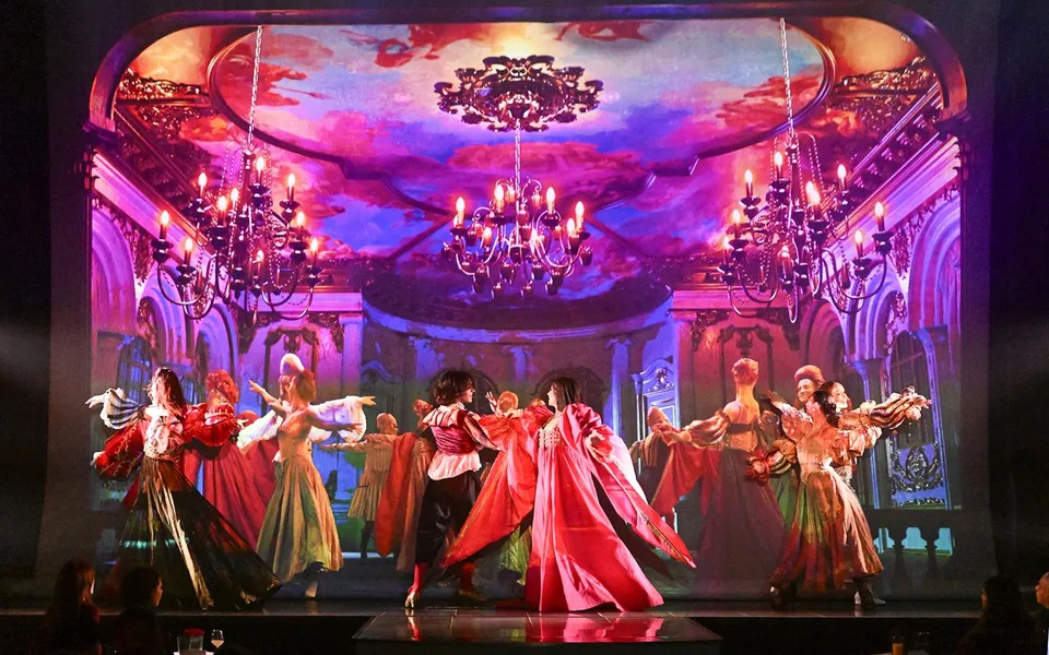 Family cabaret performance in the ornate Paradis Latin auditorium